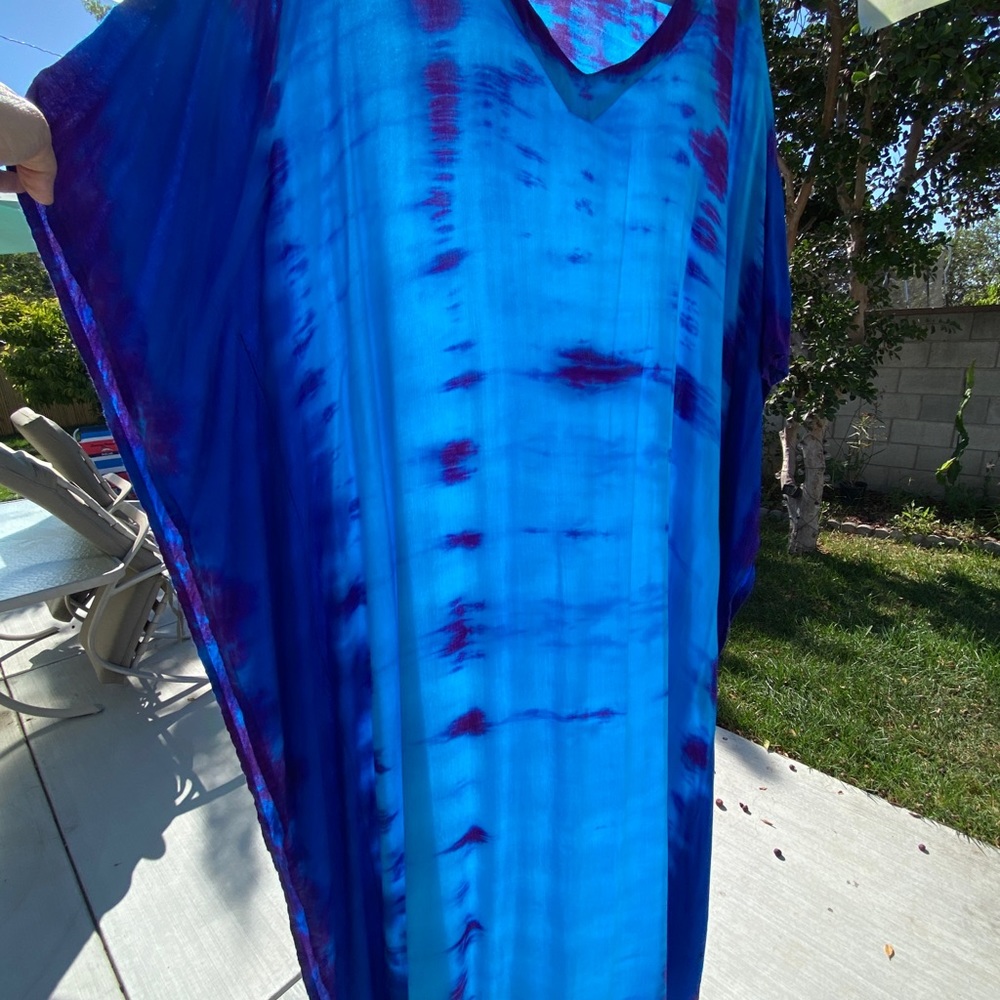 Hand tie dyed long Caftan %100 rayon. Size is one size.